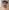 Justin Spooner, a white man with a greying beard wearing glasses and a dark green flat cap