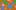 Different sized pink circles, green semi-circles and blue triangles on an orange background 