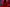 Close up of artist chopping jelly items under red lighting on a chopping board