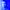 Blue portrait of Russell Tovey with short hair and stubble looking directly at the camera