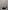 A man stands in an empty room looking down into a seemingly endless portal