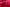 A view of the inside of A Heart to Heart with red light filtering through