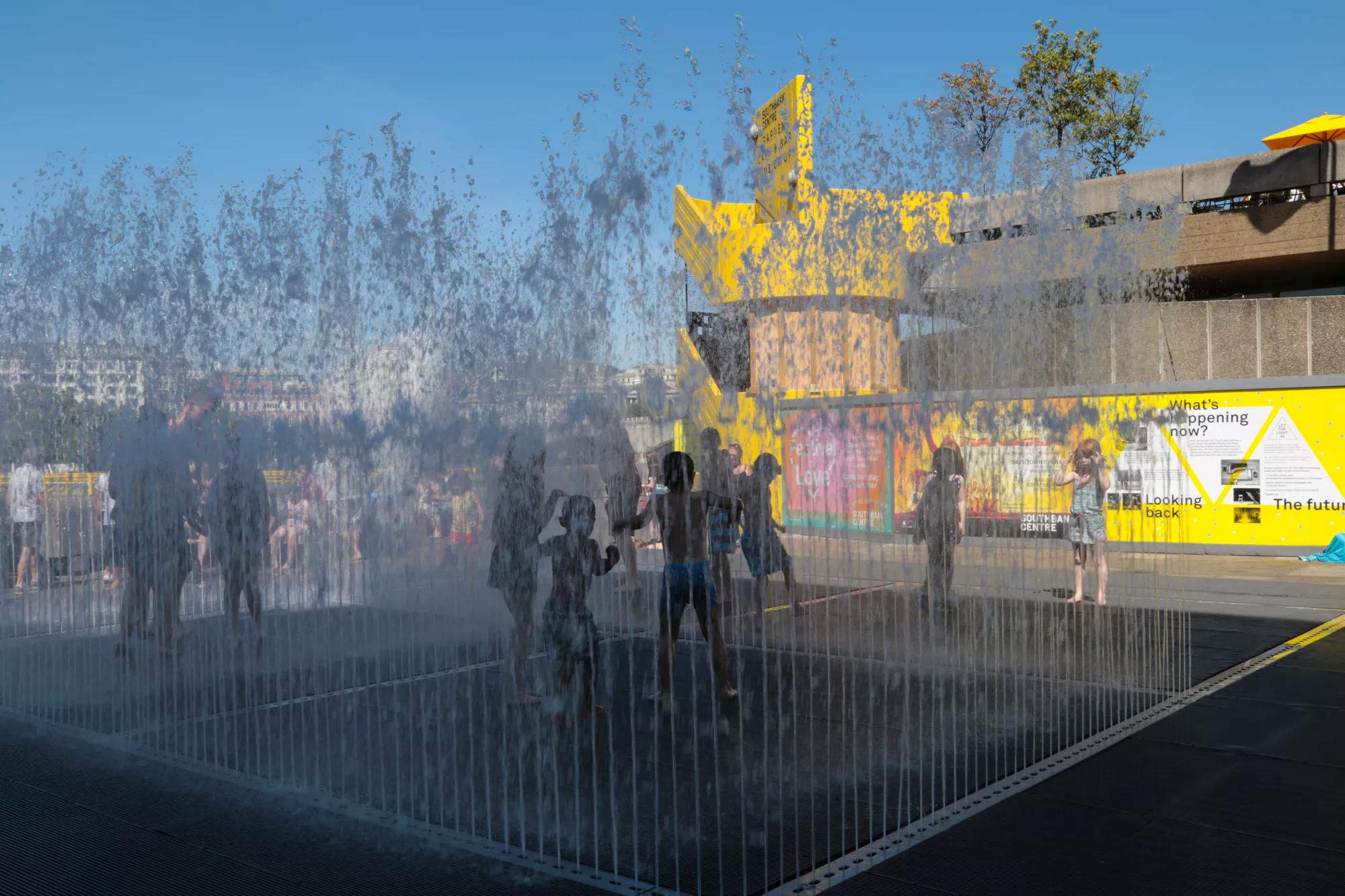 Children Playing in the Jeppe Hein Fountain