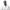 Caleb Azumah Nelson, a Black man with shaved head and goatee beard wearing a white shirt