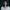 Nabihah Iqbal on a dark background in a white flowy blouse