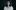 Nabihah Iqbal on a dark background in a white flowy blouse