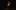 Guitarist Robert Menczel wears all back and performs alone on a darkened stage with an acoustic guitar