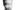 Black and white portrait of Afghan interpreter. Image is pixelated and blurred to allow for anonymity of the subject. 