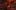 Digital art of a massive red demon with large horns looming over four dark, hellish figures in a fiery landscape.